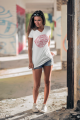 mockup-of-a-woman-wearing-a-v-neck-tee-with-a-cool-outfit-3684-el1 (2).png