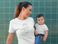 baby-boy-and-his-mom-wearing-different-round-neck-tees-mockup-while-against-a-green-tiles-wall-16095.png