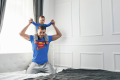t-shirt-mockup-of-a-father-carrying-his-son-on-his-shoulders-34259-r-el2.png